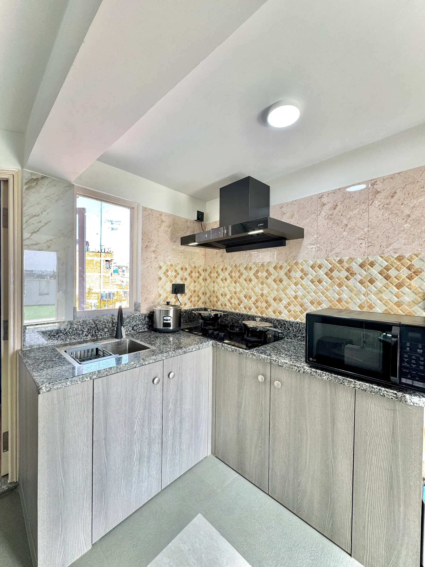Furnished bedroom in the high-floor three-bedroom apartment